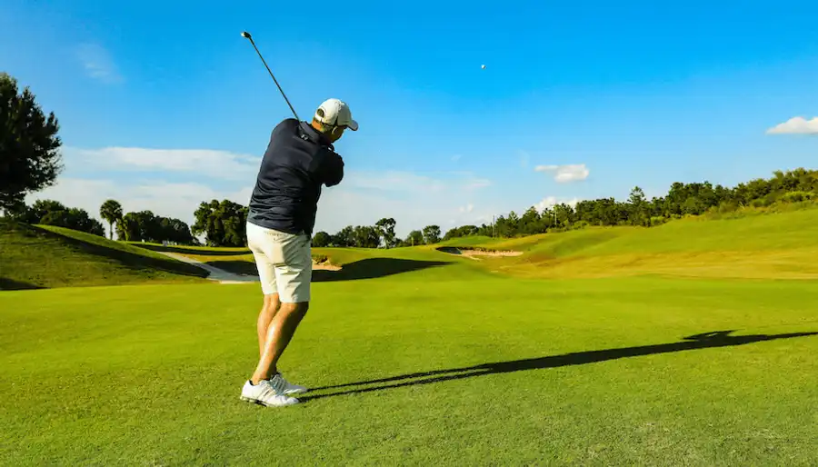 Golfer having just hit a shot on the golf course